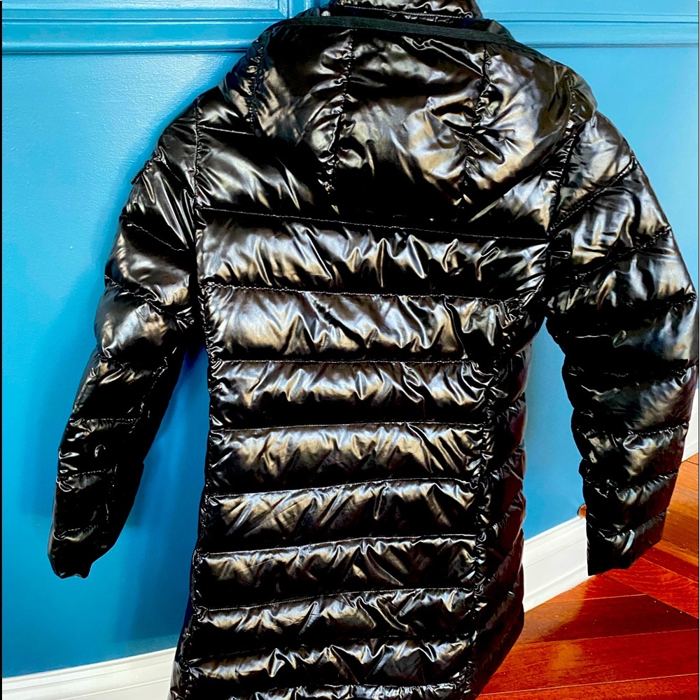 Black kids size 10 Moncler coat removable hood snap closure. Front zip pockets.